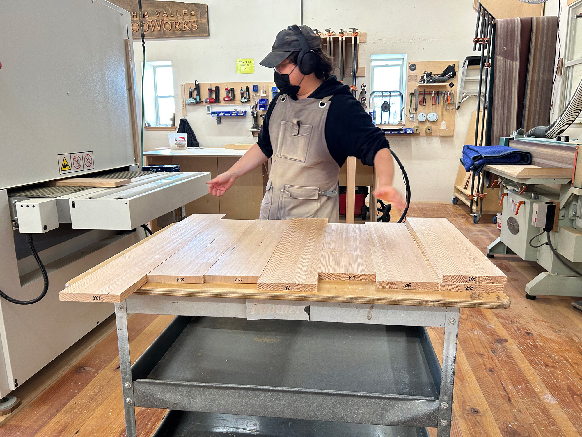 Cabinet Makers in Dallas installing custom wood kitchen cabinets