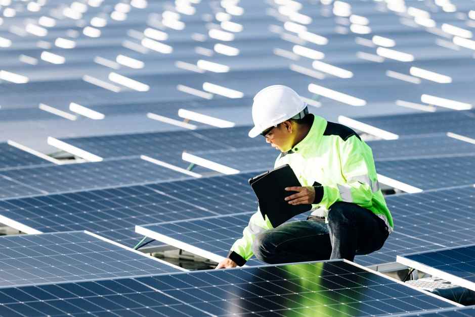 A technician working on solar panel
